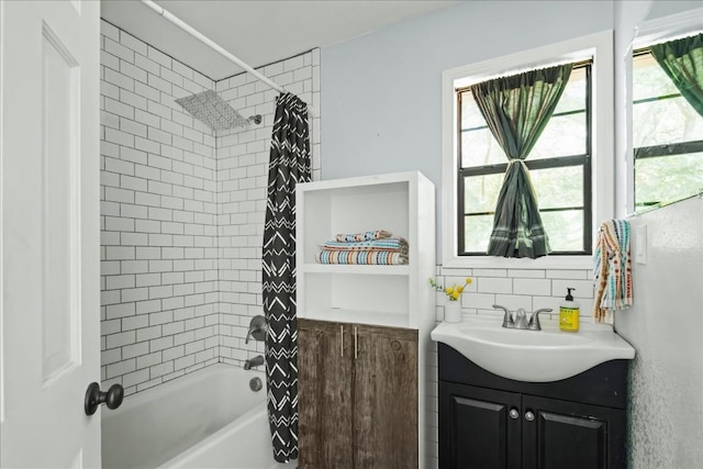 2108 River Hills Rd, Austin, TX 78733 - full bathroom with vanity, shower / tub combo with curtain, and decorative backsplash