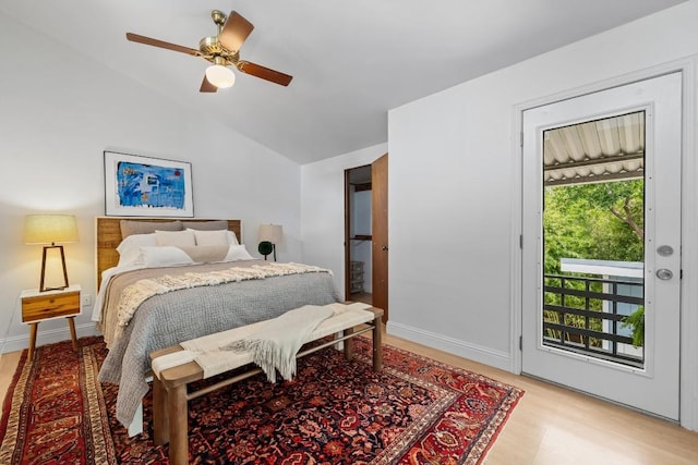 1202 E 30th St, Austin, TX 78722 - bedroom featuring access to exterior, baseboards, light wood-type flooring, and lofted ceiling