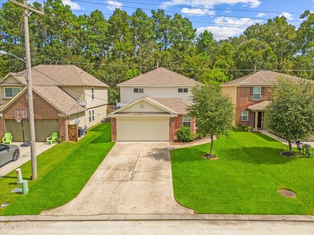 front of property with a garage and a front lawn