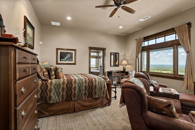 carpeted bedroom featuring ceiling fan