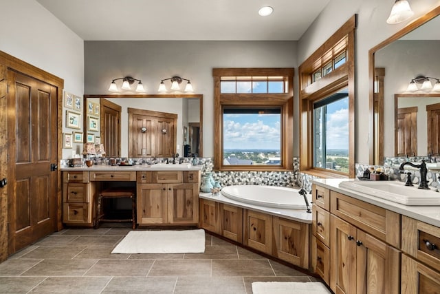 bathroom featuring a tub, decorative backsplash, tile patterned flooring, and double sink vanity