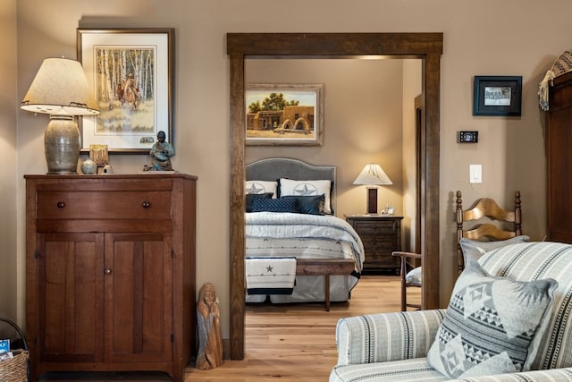 bedroom with light hardwood / wood-style floors