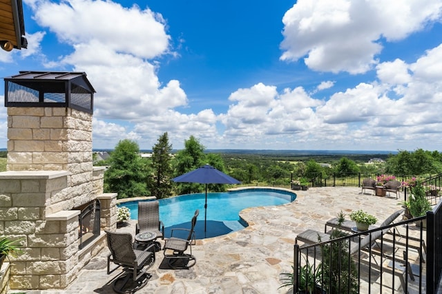 view of pool with a patio area