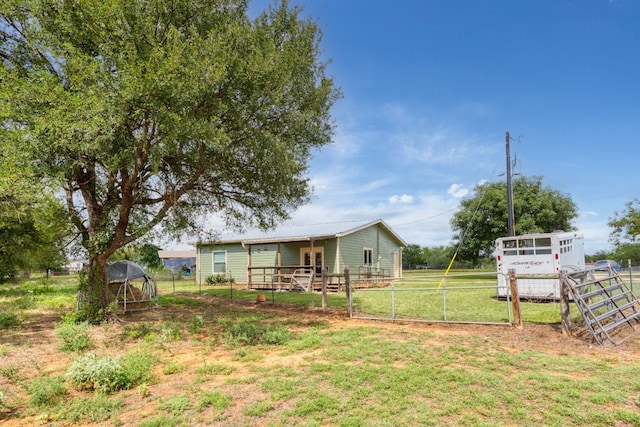 view of yard with fence and a gate