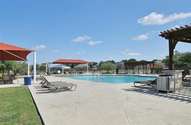 view of swimming pool with a patio area and a pergola