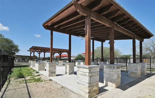 view of property's community with a patio area