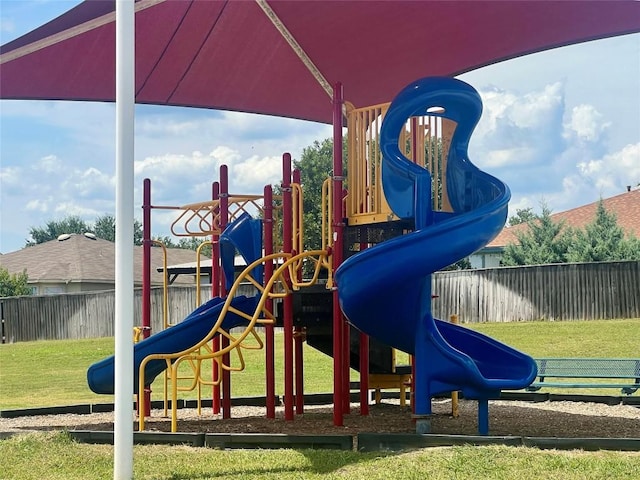 view of jungle gym featuring a yard