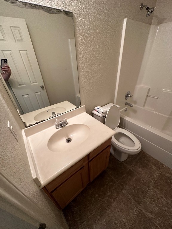 full bathroom with vanity, shower / tub combination, toilet, and tile patterned flooring