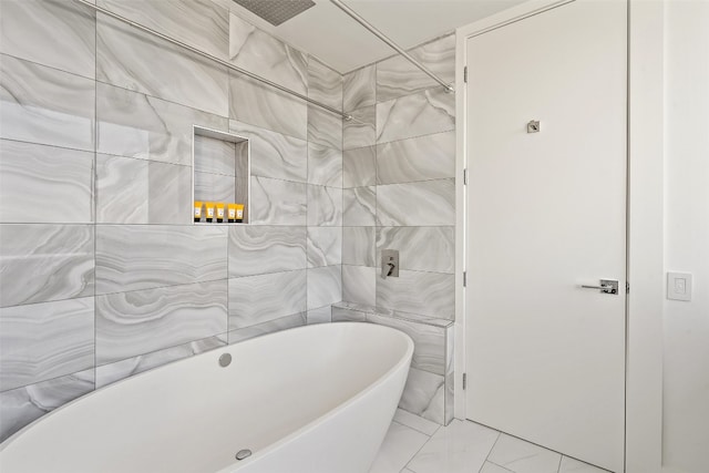 bathroom with plus walk in shower, tile walls, and tile patterned flooring