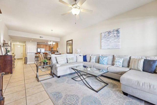 1000 The Cape Rd Unit 24, Horseshoe Bay, TX 78657 - living area with light tile patterned floors, ceiling fan, and a chandelier
