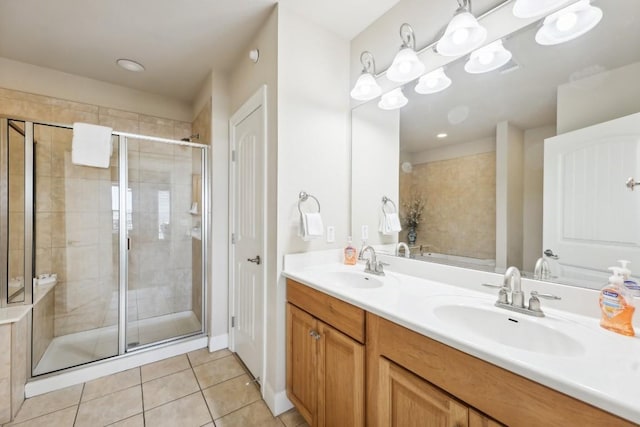 1000 The Cape Rd Unit 24, Horseshoe Bay, TX 78657 - bathroom featuring double vanity, tile patterned flooring, and a stall shower