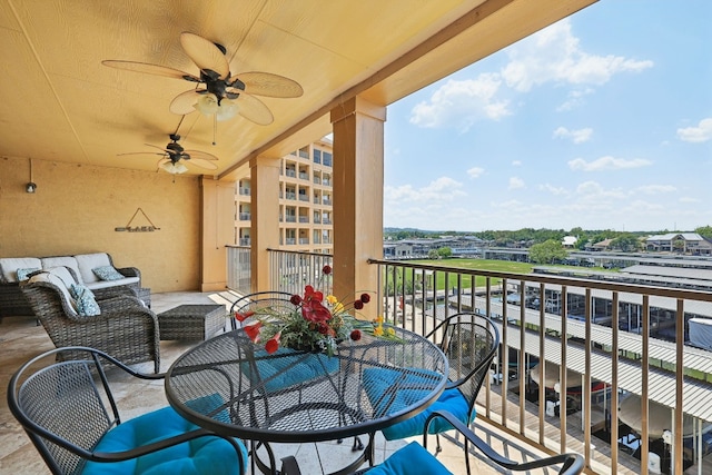 1000 The Cape Rd Unit 24, Horseshoe Bay, TX 78657 - balcony with ceiling fan and outdoor lounge area