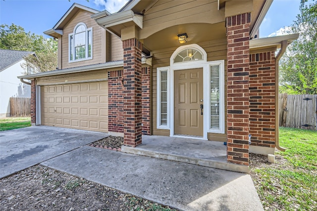 entrance to property featuring a garage