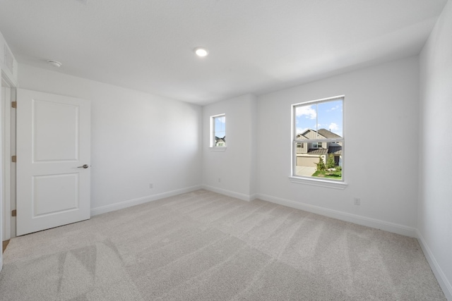 view of carpeted spare room