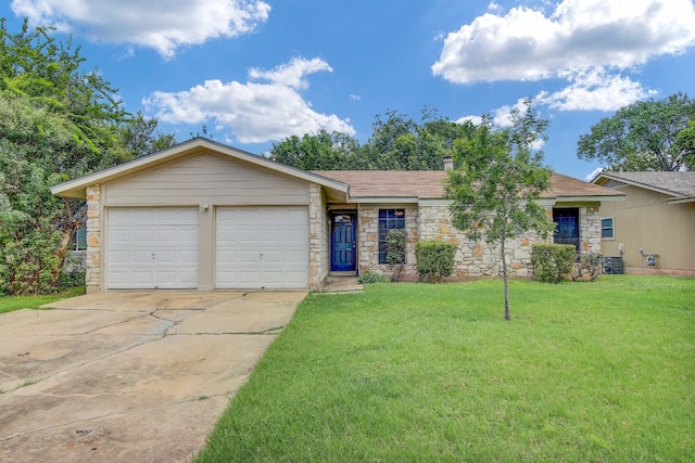 ranch-style home with a garage, central AC unit, and a front yard