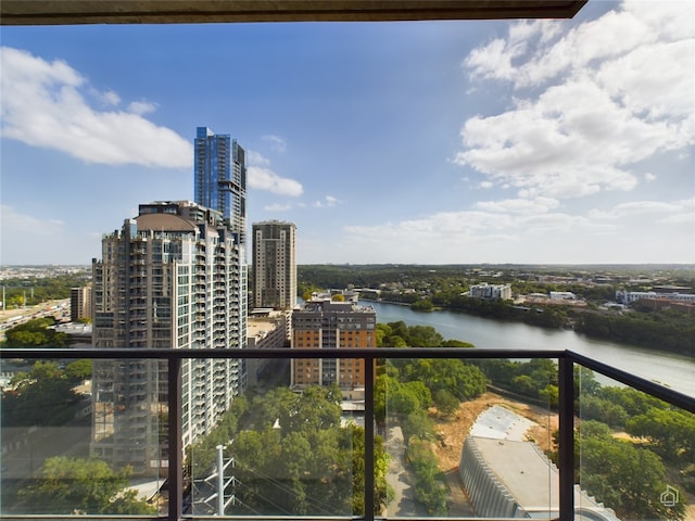 balcony featuring a water view