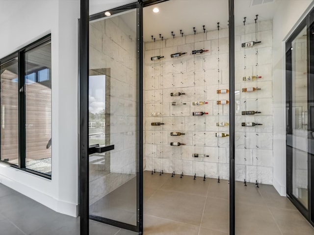 wine cellar with tile patterned flooring