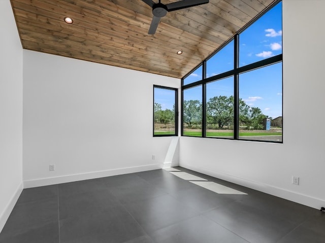 unfurnished room featuring ceiling fan, tile patterned flooring, high vaulted ceiling, and wooden ceiling