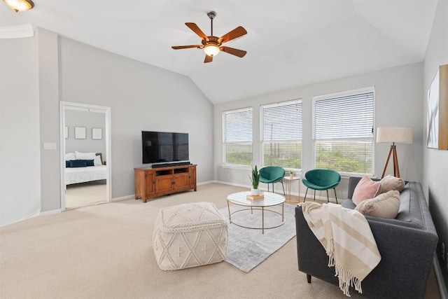 carpeted living room featuring lofted ceiling and ceiling fan