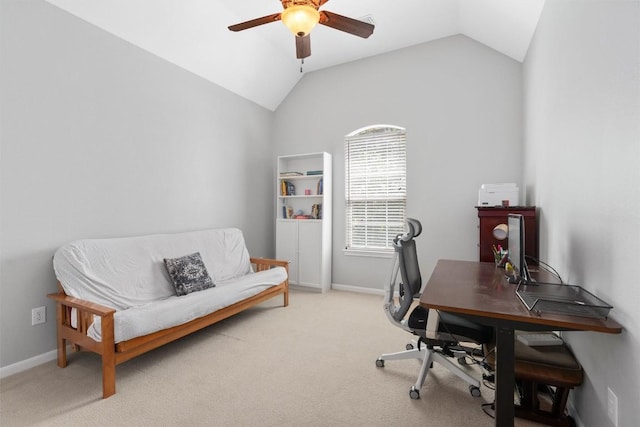 carpeted office with vaulted ceiling and ceiling fan