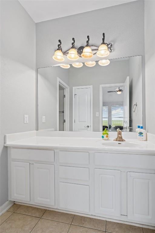 bathroom with vanity and tile patterned flooring