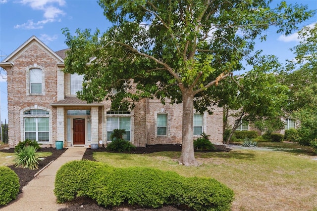 view of front of home with a front lawn