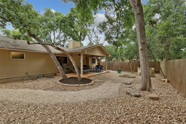 back of house with a patio area