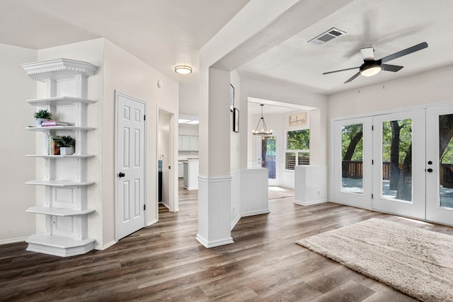 entrance foyer with french doors, ceiling fan, and hardwood / wood-style floors