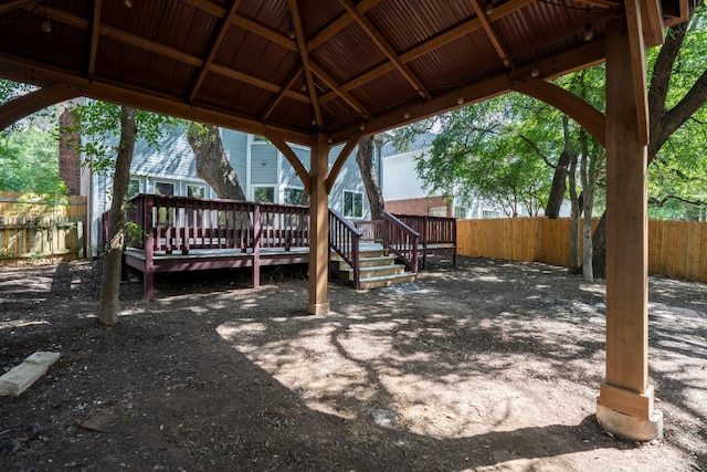 view of yard with a gazebo and a wooden deck