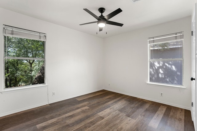 empty room featuring hardwood / wood-style flooring and ceiling fan