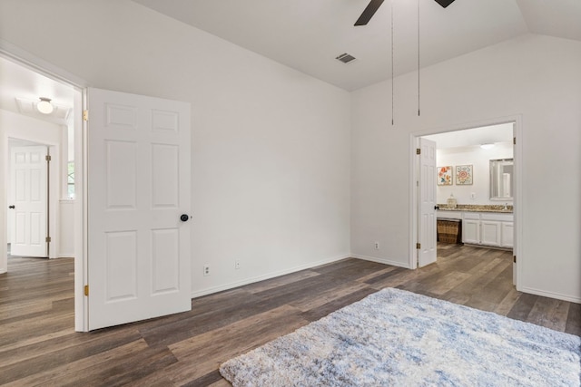 bedroom featuring lofted ceiling, ceiling fan, and dark wood-type flooring