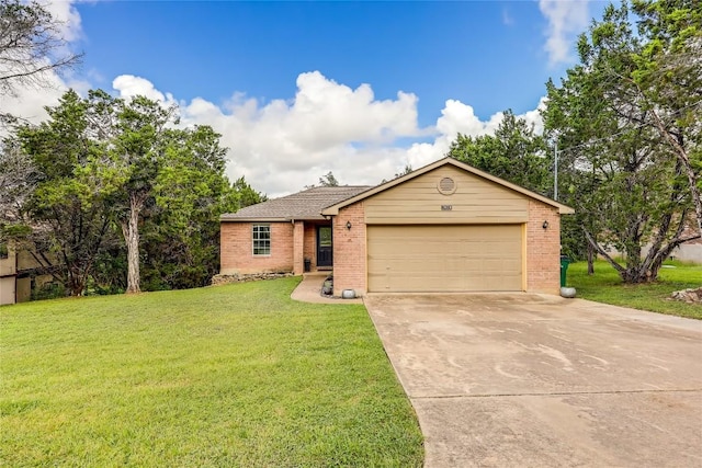 ranch-style house featuring a front lawn and a garage