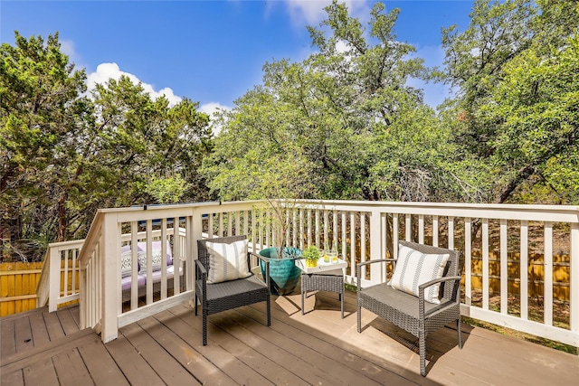 deck featuring an outdoor living space