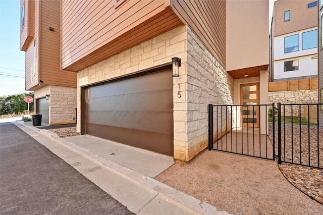 view of property exterior with a garage