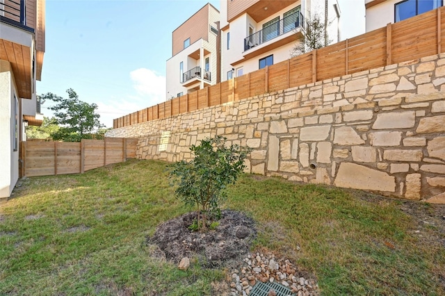 view of yard featuring fence