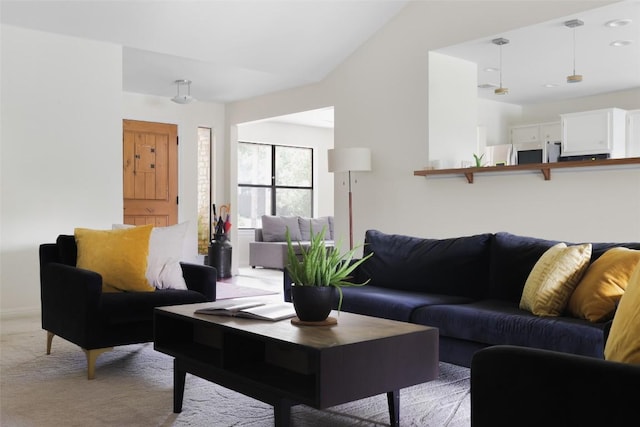 living area with light carpet