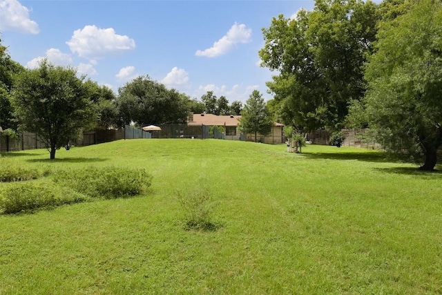 view of yard featuring fence