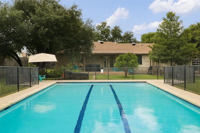 view of pool featuring a patio area, fence, and a fenced in pool