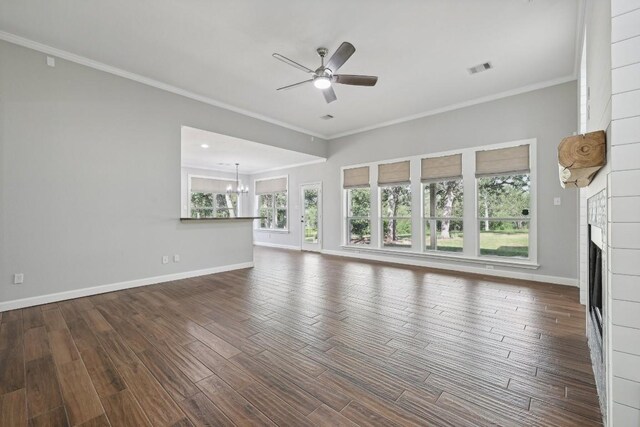 unfurnished living room featuring ceiling fan, hardwood / wood-style flooring, and ornamental molding