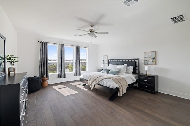 bedroom featuring dark hardwood / wood-style floors and ceiling fan