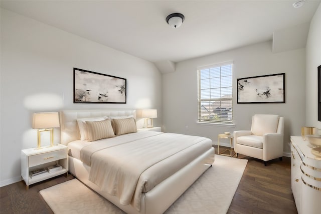 bedroom featuring dark hardwood / wood-style floors