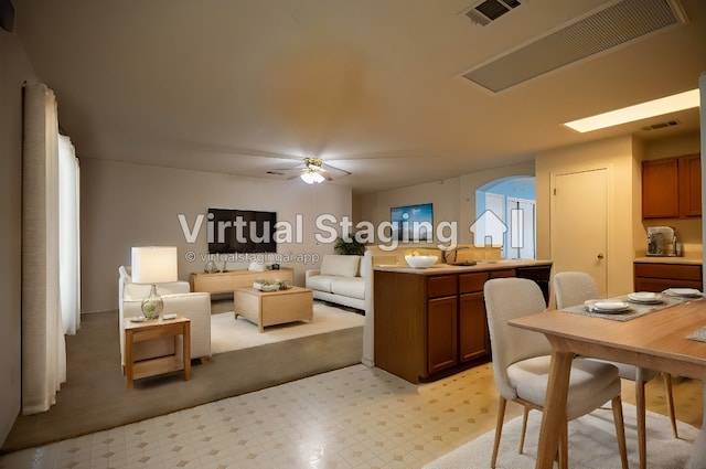 living room featuring ceiling fan