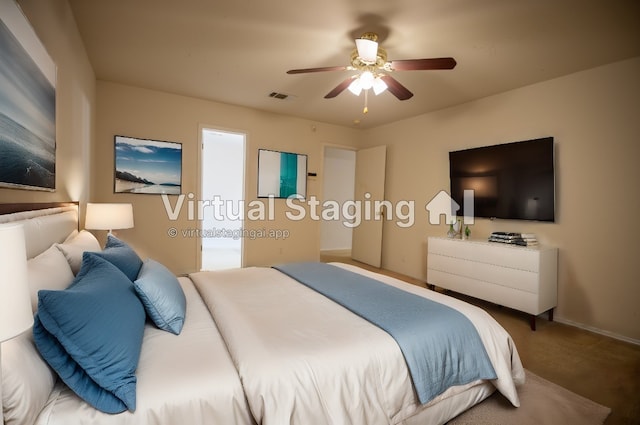 bedroom with ceiling fan and carpet flooring