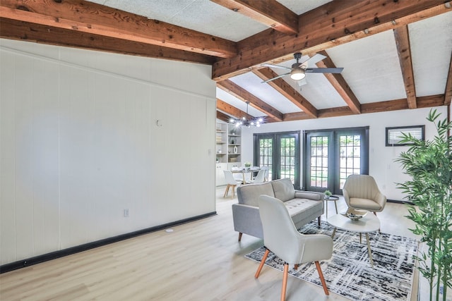 living room with light wood-type flooring, vaulted ceiling with beams, and ceiling fan