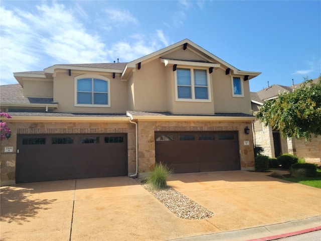 view of front of property with a garage