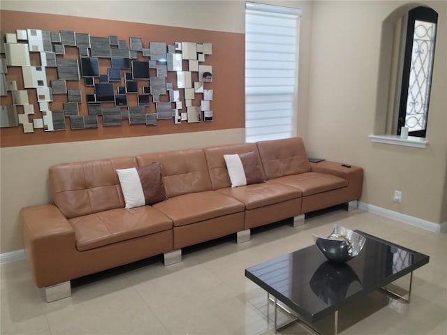 living room with light tile patterned floors