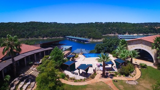 birds eye view of property with a water view