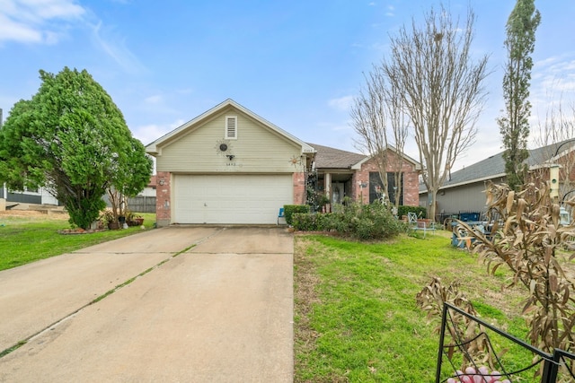 single story home featuring a garage and a front yard