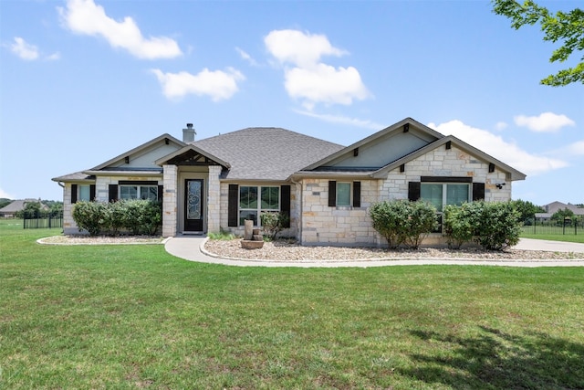 view of front of home with a front lawn