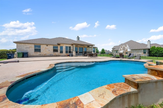 view of pool featuring a patio area